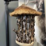 Hangend vogelhuisje van kokos