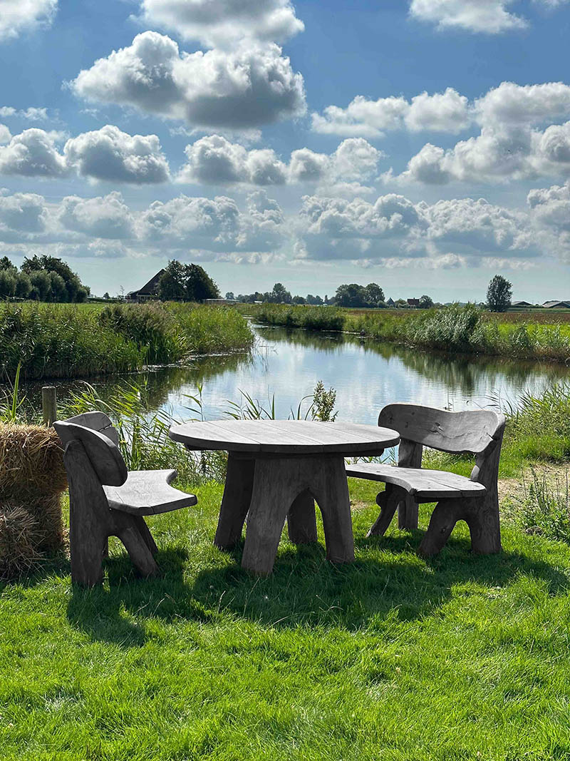 Rond eiken tuinset Athilla met 2 banken in grijze olie
