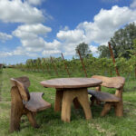 Rond eiken tuinset Athilla met 2 banken in licht bruine olie