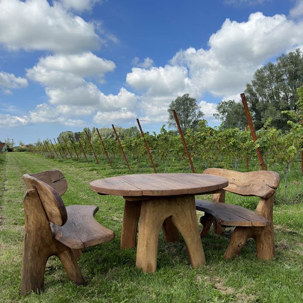 Rond eiken tuinset Athilla met 2 banken in licht bruine olie