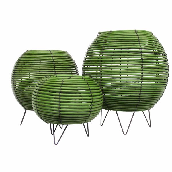 Windlicht van rotan met een warme sfeerverlichting