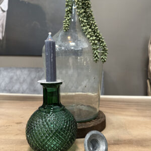 Metalen kaarshouder voor in een fles om van een wijnfles een kandelaar te maken.